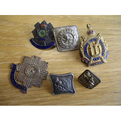 233 - Collection of mostly Scottish Regiments cap badges, shoulder titles, pin badges etc including Royal ... 