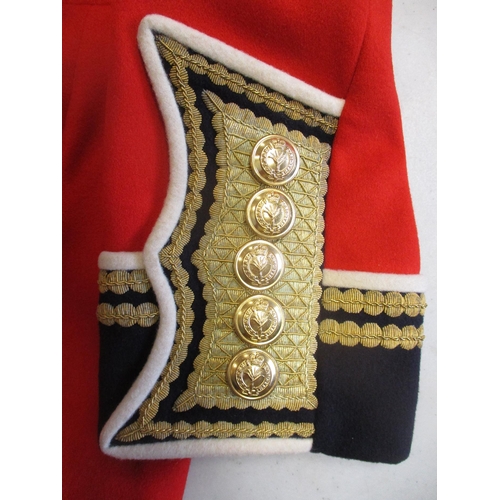 244 - Welsh Guards officer's ceremonial red tunic jacket made by J. Dege & Sons Ltd, Savile Row, heavily e... 