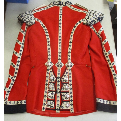 245 - Range of Guards ceremonial red tunic jackets with Grenadier Guards drummer's tunic by Hobson & Sons,... 