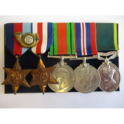 26 - WW2 groups court mounted for display with cap badge with:
1. 1939-1945, France and Germany Stars, De... 