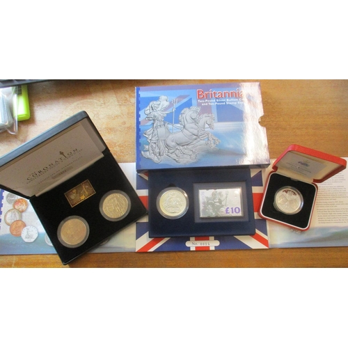 411 - IG lot - documents required. 2001 St George + The Dragon boxed sovereign and silver ingot uncirculat... 