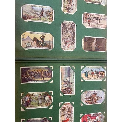 38a - Mostly complete sets in corner mounted album including  Players 1914 Victoria Cross, Napoleon 1915, ... 