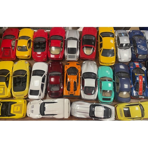 392 - UT Models. Collection with accompanying boxes including 1/18 Ford Escort, Porsche 911 series, Chevro... 