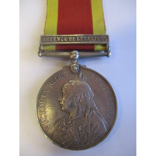 66 - 1900 China Medal Defence of Legations clasp to Pvte C. Baker R.M.L.I. very fine. Only 78 clasps to t... 