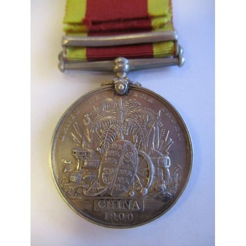 66 - 1900 China Medal Defence of Legations clasp to Pvte C. Baker R.M.L.I. very fine. Only 78 clasps to t... 