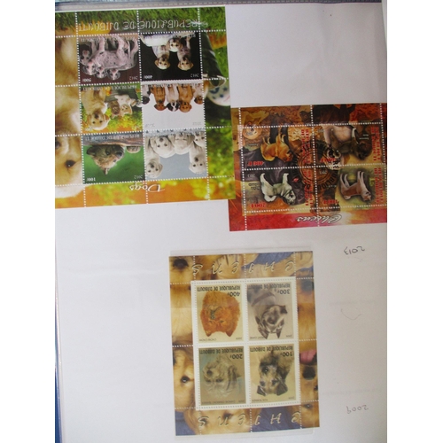 134 - Dogs. Themed coln in five binders, A to Z, with UM & FU issues incl Benin, Burundi MS’s, Djibouti MS... 