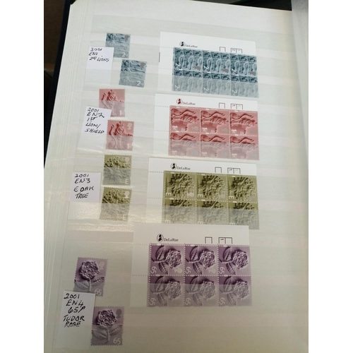 406 - UM definitives coln with Machins and Regional defins in dupl singles, blocks of 6, bklts etc. In 11 ... 