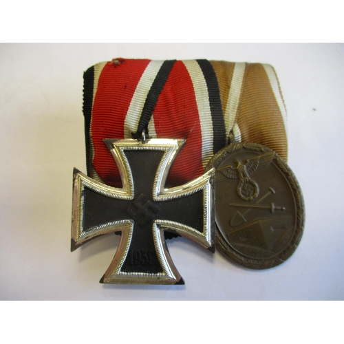 101 - Germany. Third Reich 1939 Iron Cross Second Class and Westwall Medal good very fine, court mounted i... 