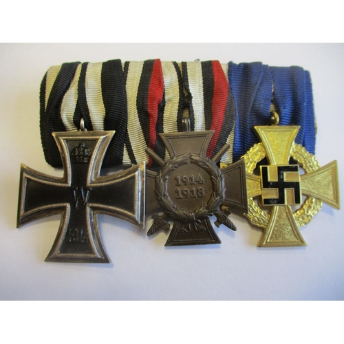 103 - Germany. 1914 Iron Cross Second Class, WW1 Hindenburg Cross and Third Reich Faithful Service Decorat... 