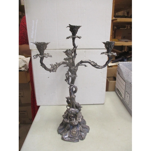 123 - A large heavy silver coloured 2 piece Warwickshire Regimental centre piece of very ornate candelabru... 