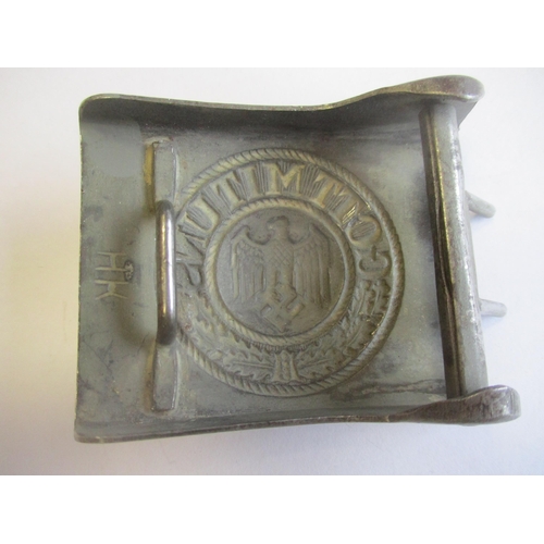 124 - Third Reich belt buckles with:
1. Luftwaffe, reverse stamped GB (Gustav Brehmer), leather tab stampe... 