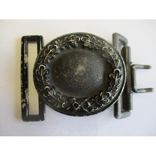 124 - Third Reich belt buckles with:
1. Luftwaffe, reverse stamped GB (Gustav Brehmer), leather tab stampe... 