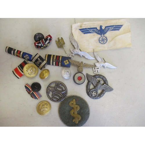 125 - Third Reich range including small swastika pennant, Army Bevo breast eagle part roll of 10 uncut, Kr... 