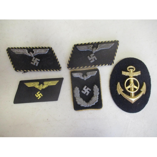 125 - Third Reich range including small swastika pennant, Army Bevo breast eagle part roll of 10 uncut, Kr... 