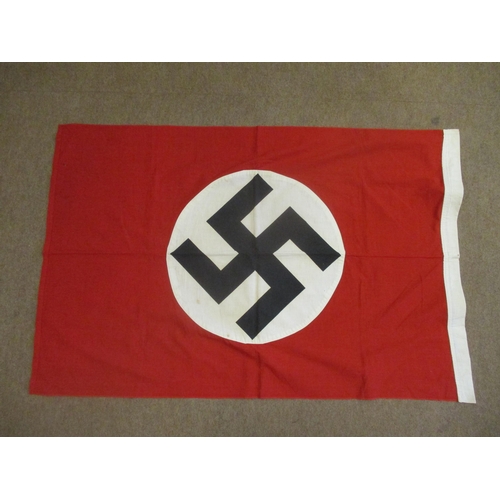 131 - Third Reich flag 110cm x 85cm, black swastika on white circle with remainder red, no makers details,... 