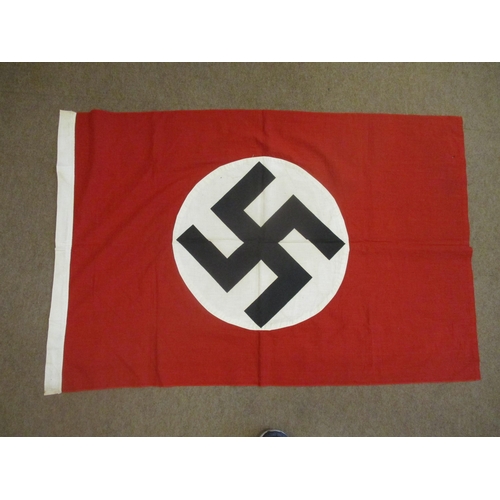 131 - Third Reich flag 110cm x 85cm, black swastika on white circle with remainder red, no makers details,... 