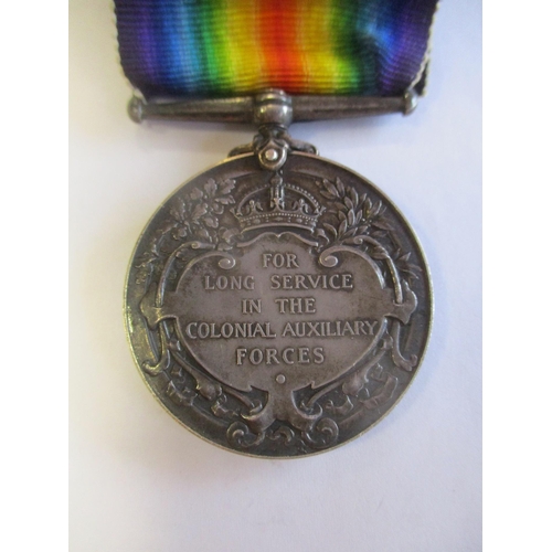 16 - Family range with:
1. KGV Colonial Auxiliary Forces Long Service Medal to No 419 Trooper James Carve... 