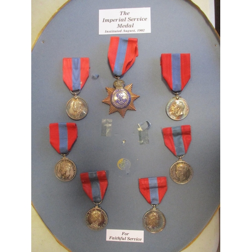 21 - Imperial Service Medal collection with boxed KGV Star to John Kerr, unboxed in oval frame with KEVII... 