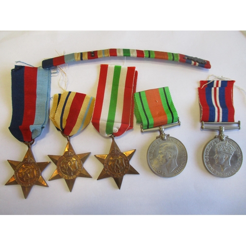 32 - Range with:
1. WW2 1939-1945, Africa, Italy Stars, Defence Medal and BWM nearly mint. With R Sigs bo... 