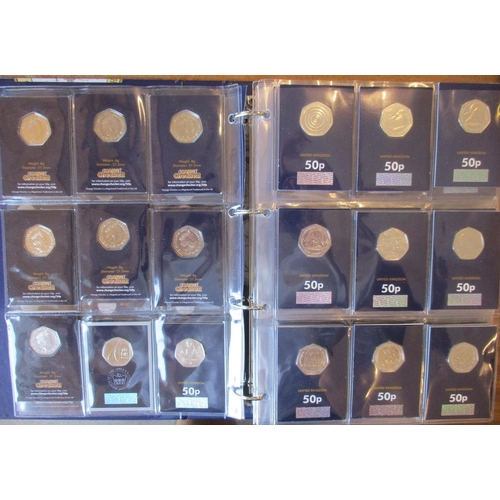 446 - Collection of uncirculated CuNi £5, £2, 50p and 10p on Change Checker cards in 2 albums, includes Be... 