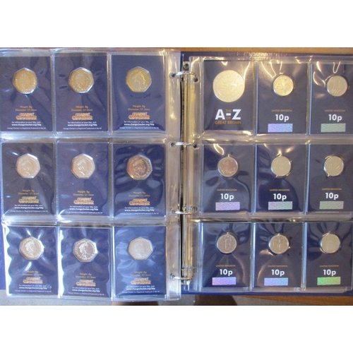 446 - Collection of uncirculated CuNi £5, £2, 50p and 10p on Change Checker cards in 2 albums, includes Be... 