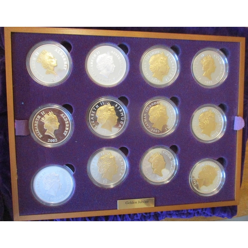 506 - 2002 Golden Jubilee silver proof cased set of 24 FDC, with Alderney £5 (2), Australia $1 (2), Bermud... 