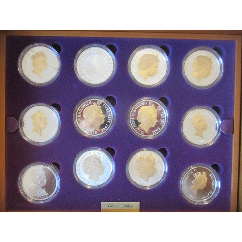 506 - 2002 Golden Jubilee silver proof cased set of 24 FDC, with Alderney £5 (2), Australia $1 (2), Bermud... 