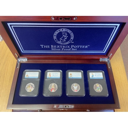 526 - Collection with Gibraltar 2018 Father Christmas silver proof piedfort 50p, silver proof sets Beatrix... 