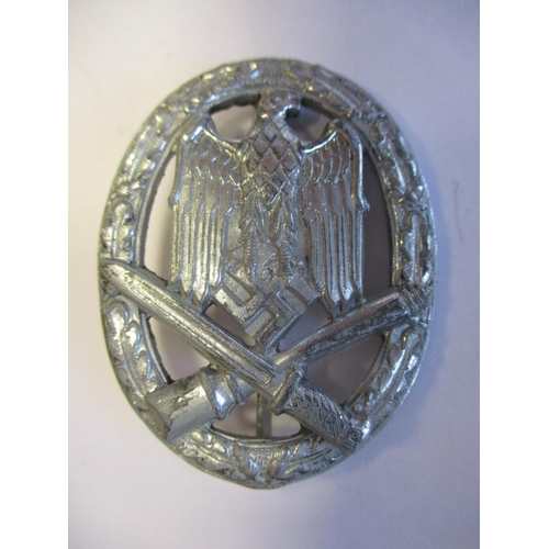 79 - Germany. Third Reich range with:
1. DRL Sports Badge, silver, 3rd Type, reverse marked D.R.G.M. 3526... 