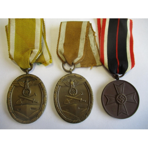 82 - Germany. Third Reich range with War Merit Cross with swords Second Class (2), Westwall Medal (2), Wa... 