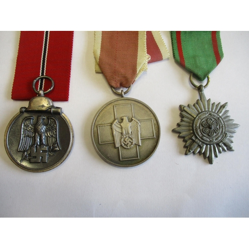 82 - Germany. Third Reich range with War Merit Cross with swords Second Class (2), Westwall Medal (2), Wa... 