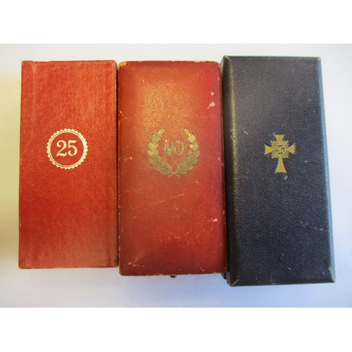 83 - Germany. Third Reich boxed range with:
1. Faithful Service Decoration Second Class, box with C.F. Zi... 