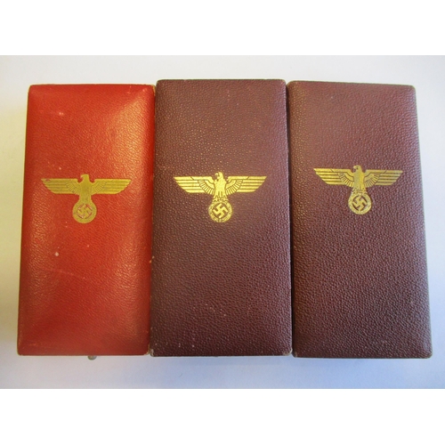 83 - Germany. Third Reich boxed range with:
1. Faithful Service Decoration Second Class, box with C.F. Zi... 