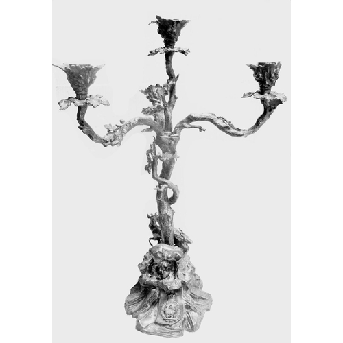 123 - A large heavy silver coloured 2 piece Warwickshire Regimental centre piece of very ornate candelabru... 