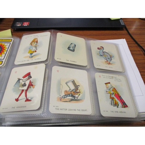 150 - Collection of complete sets in 2 albums in variable condition, including Carreras 1930 Alice in Wond... 