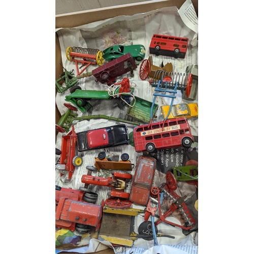 393 - Accumulation of toys featuring Dinky No. 300 Massey-Harris, generally fair to good in a good to exce... 