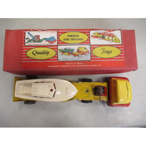 410 - Wells-Brimtoy. Boat Carrier No 607 Bedford S-type yellow and red cab, yellow trailer with red and wh... 