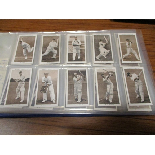 73 - Collection of complete and part sets in an album, generally good, with Dobie 1924 Weapons of all Age... 