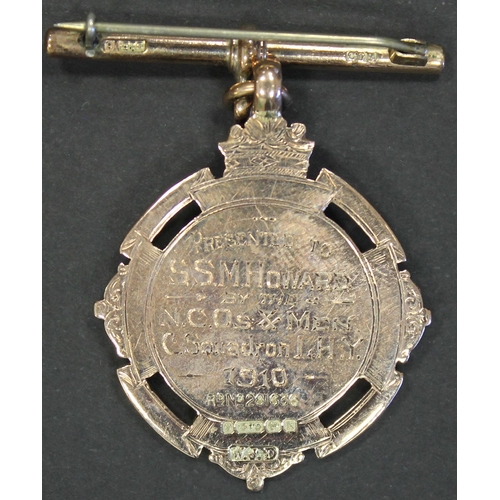 111 - 1910 Lancashire Hussars 9ct gold and enamel medal weighing 17.98g engraved 