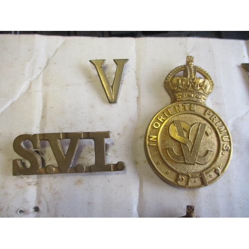 112 - Singapore badge and button range including Singapore Volunteer Corps cap badges (KC) (2), shoulder t... 