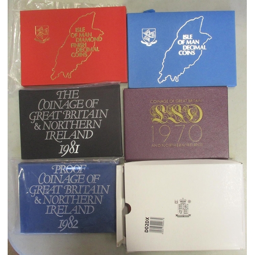 495 - Collection with GB proof cased sets FDC 1970, 81, 82, de-luxe proof cased set 2002, USA 1968 proof s... 