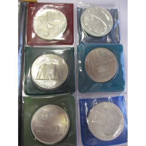 506 - World range in small Schulz coin album, some silver, including China Junk dollar, Maria Theresa thal... 