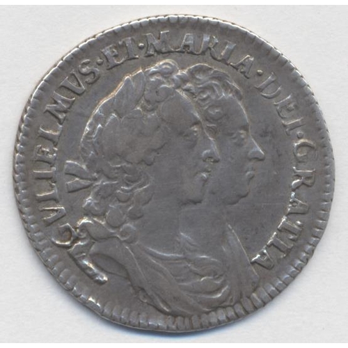 294 - 1693 sixpence very fine. (See photo) (Y)