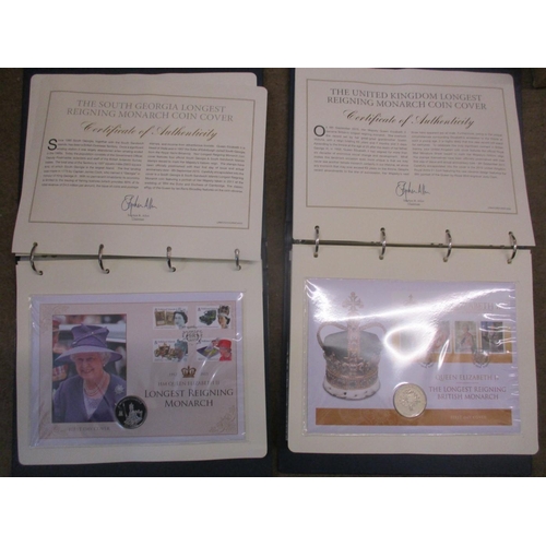 490 - Pair of world coin cover collections of various denominations in 3 folders, with the 2000 'The Mille... 