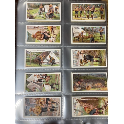 163 - Ogdens. Collection in album with complete sets including Boy Scouts blue/ black, third series, fifth... 