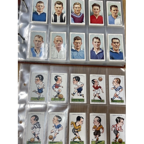 164 - Ogdens. Collection in album with complete sets including Football Caricatures, Football Captains, Fa... 