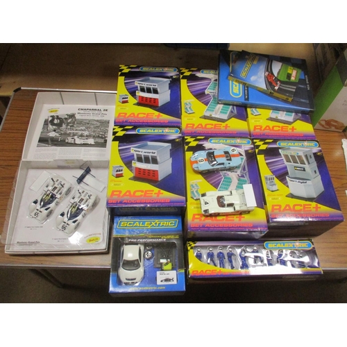 364 - Range of slot cars and track accessories, generally mint in excellent to mint boxes, with Autoart Sl... 