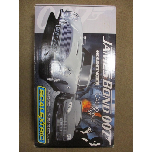 371 - Scalextric. Range of James Bond slot car sets, all mint in excellent boxes, with C1254 'Goldfinger &... 