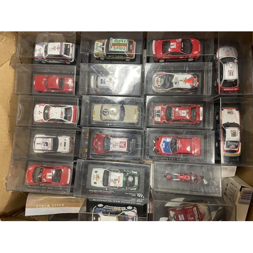 438 - Collection with 1/43 DeAgostini rally cars in clear plastic display cases generally excellent in goo... 