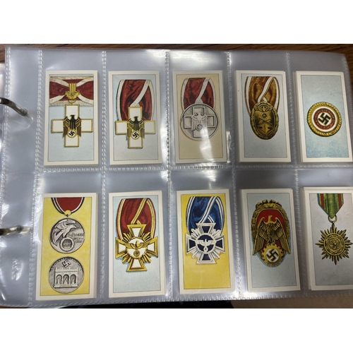 62 - Collection in album with part and complete sets including Oliver German Uniforms, German Orders and ... 